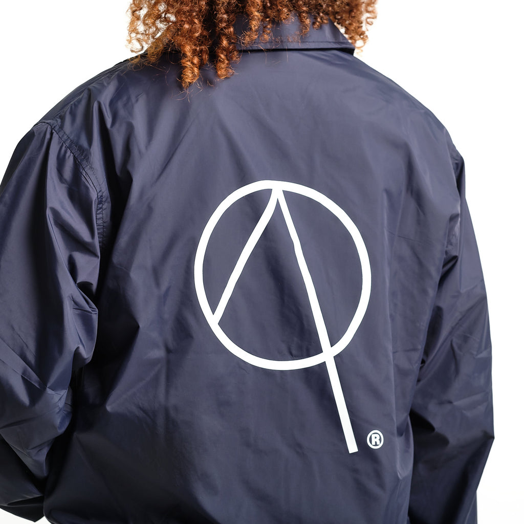 Rewind back print coach jacket in navy