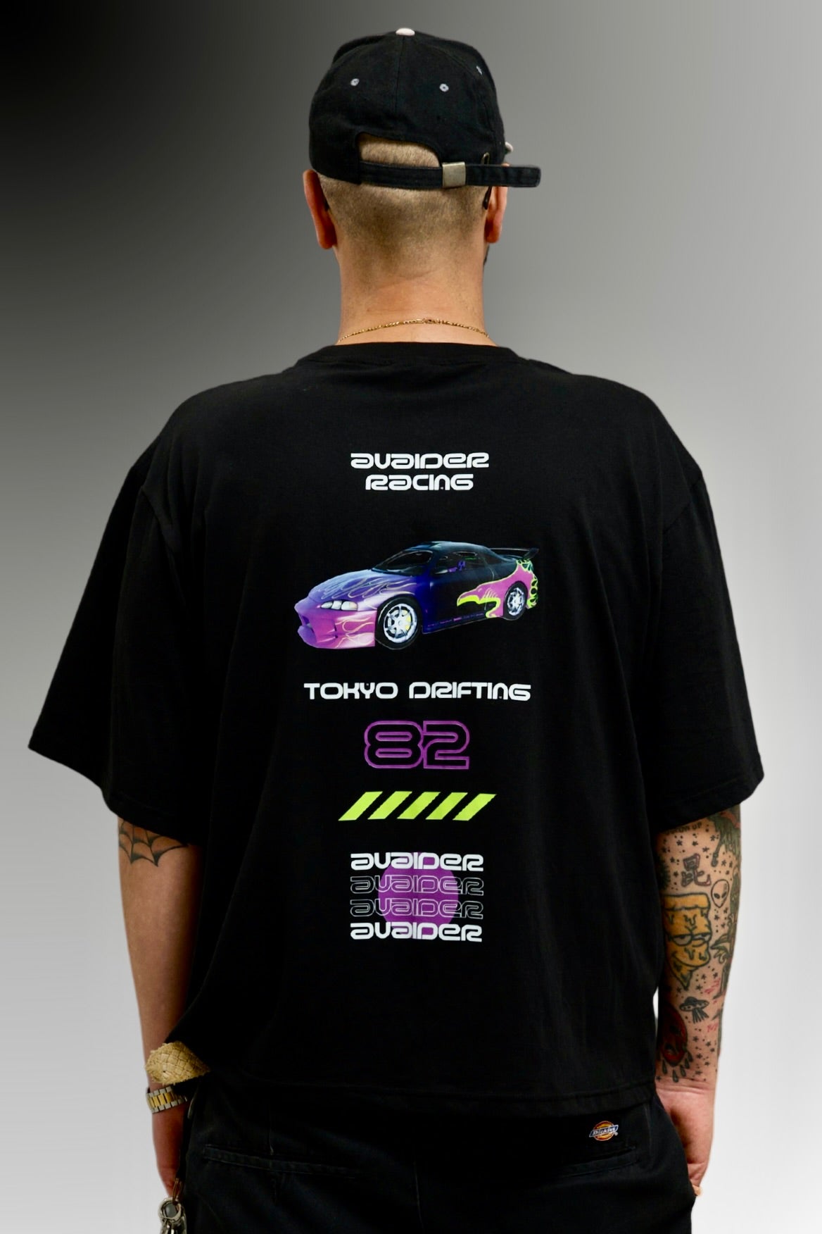 Racing Box Fit Unisex T Shirt In Black Purple And Neon