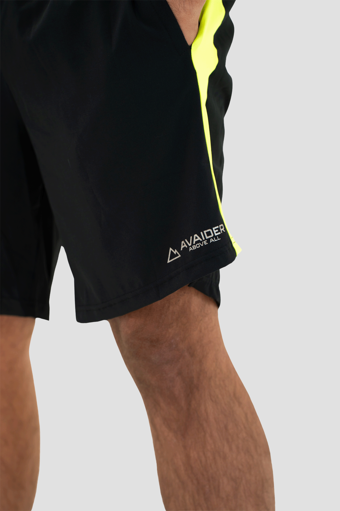 PRECISION SHORTS IN BLACK AND NEON