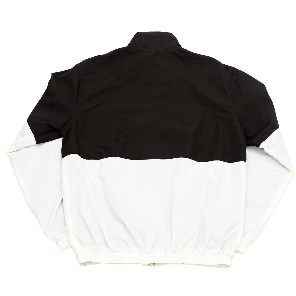 ADELPHI WOVEN TRACK TOP IN BLACK AND WHITE