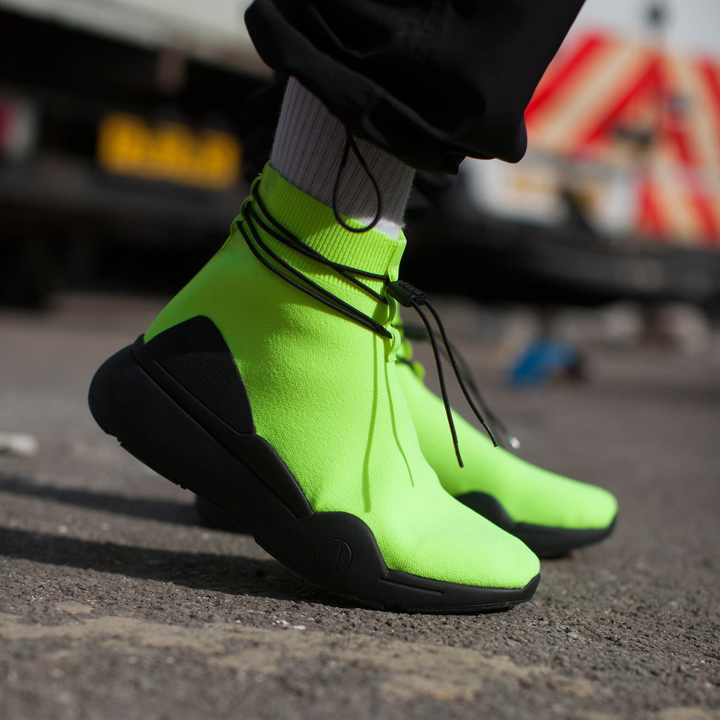 Ellipsis sock trainer in neon green and black